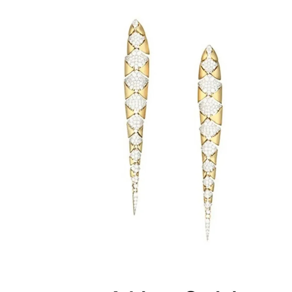 Adriana Orsini 18K gold plated crystal earrings.